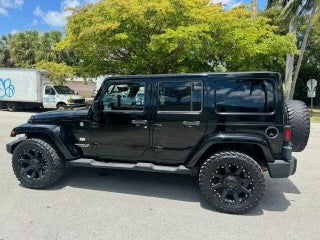 2011 Jeep Wrangler Unlimited thumbnail – Miami, FL – 14